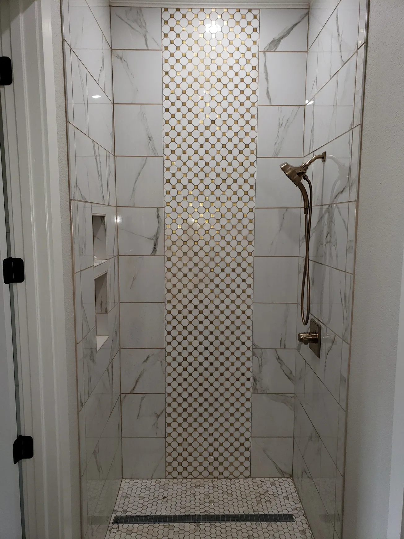 Custom shower remodel completed by Copper Bear Plumbing